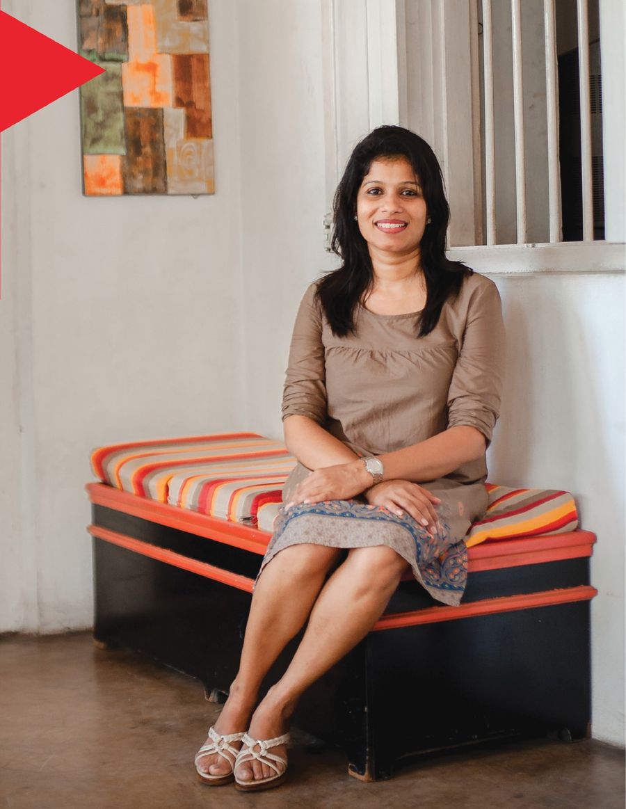 Mrs. Dilum Weliwita seated on a bench