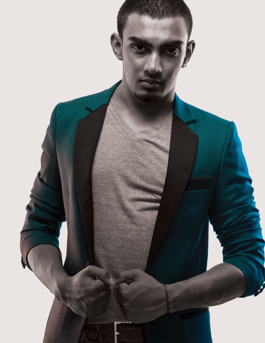 Ryan De Mel in a green jacket, photographed for The Dosage